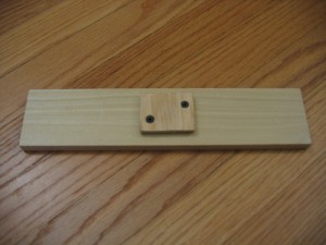 Position your screws in opposite corners.