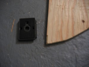 Binocular Mount E Cut a small piece of scrap wood.