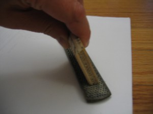Binocular Mount O Hold the wood at the correct angle and drag across the file